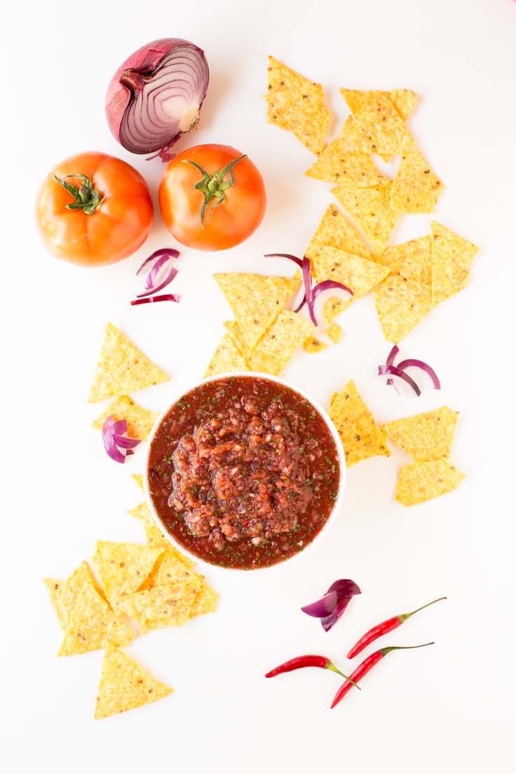 Salsa With Tortilla Chips - You're going to love this salsa, is so tasty, spicy and you just have to blend all the ingredients in a food processor.