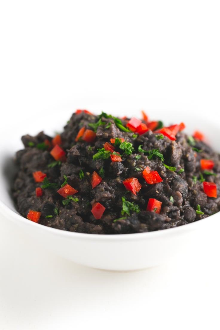 Cuban-style black beans - This recipe is simple, but so tasty and is ready in less than 30 minutes. I love my beans with rice, so I always eat this stew with some Basmati rice.