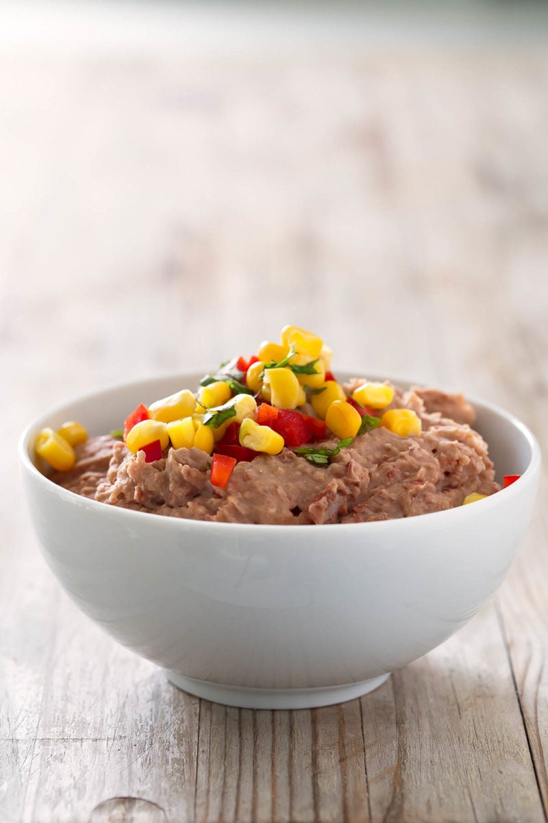 Fat Free Vegan Refried Beans.- You need to give this refried beans recipe a try. It's a healthier, vegan, fat-free version, but it's super tasty and so easy to make.
