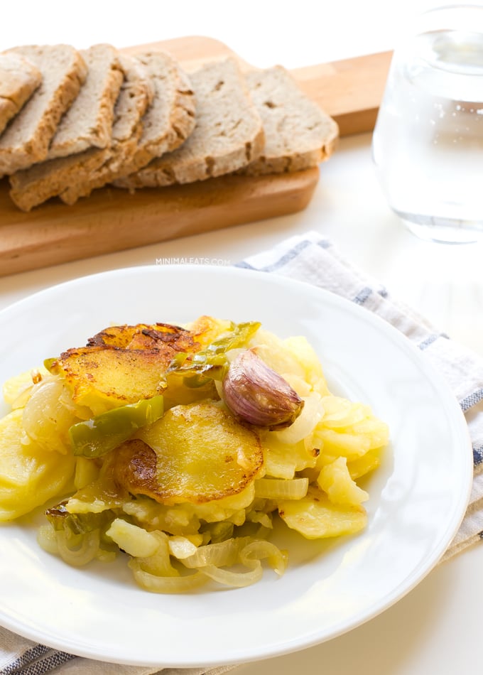 Patatas a lo Pobre (Poor Man's Potatoes). Patatas a lo pobre (poor man's potatoes) is a typical Spanish recipe and it's vegan. You only need 6 ingredients to make this delicious recipe | minimaleats.com #minimaleats #vegan #glutenfree