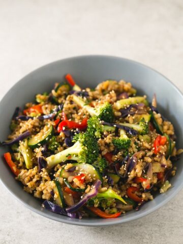 Brown Rice Stir-Fry with Vegetables - I make this brown rice stir-fry with vegetables every week. This recipe is life-changing and so simple. Add your favorite veggies or what's in season.