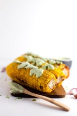 Grilled corn with vegan green aioli - This grilled corn with vegan green aioli is out of this world! It's so tasty and easy to make. You need to give it a try.