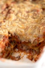 Close-up photo of a baking dish with vegan lasagna made with lentils.