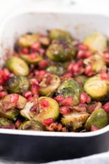 Roasted Brussels Sprouts with Pomegranate and Pecans . - Roasted Brussels sprouts! It's the perfect side for any main dish. This recipe is super tasty and simple. You need to give it a try!