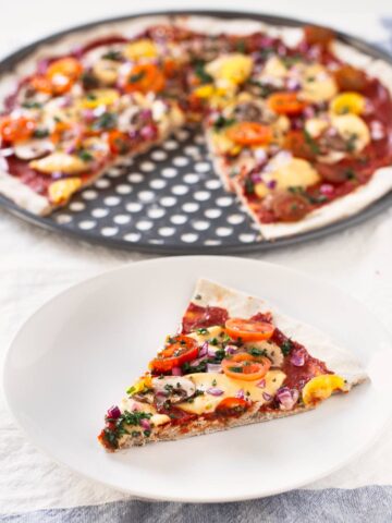 3 Ingredient Gluten Free Pizza Crust.- This vegan, gluten-free pizza crust is so easy to make and also yeast and fat-free. Besides, it requires just 3 ingredients.