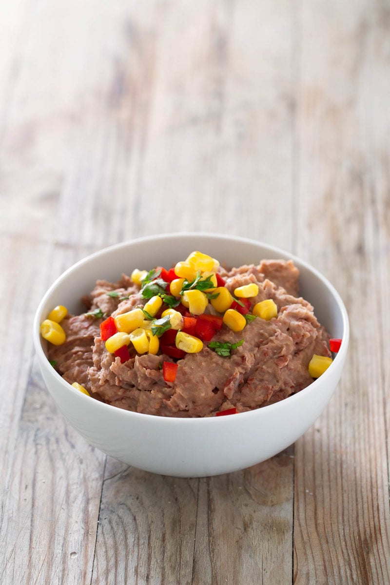 Fat Free Vegan Refried Beans.- You need to give this refried beans recipe a try. It's a healthier, vegan, fat-free version, but it's super tasty and so easy to make.