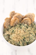 Vegan Spinach & Artichoke Dip.- This vegan spinach & artichoke dip is low in fat, so easy to make and ready in just 30 minutes. It's the perfect appetizer or snack!