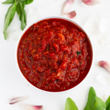 Square photo of a bowl of marinara sauce
