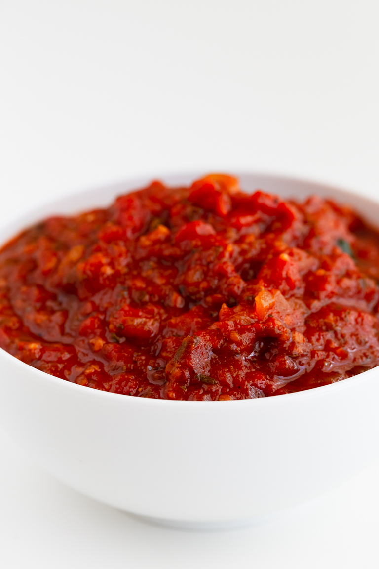 Close-up shot of a bowl of marinara sauce