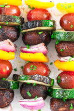 Vegetable Kabobs. - Grilled, 25-minutes vegetable kabobs, a healthy side dish to any meal. They're perfect for summertime barbecues, picnics and potlucks. #vegan #glutenfree #simpleveganblog