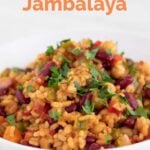 A picture of a dish of vegan jambalaya with the words vegan jambalaya