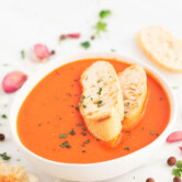 Photo of a bowl of vegan tomato soup