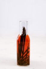 A slide shot of a bottle with homemade vanilla extract