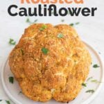 A side shot of a whole roasted cauliflower with the words whole roasted cauliflower
