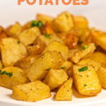 Side shot of a plate of roasted potatoes with the words roasted potatoes