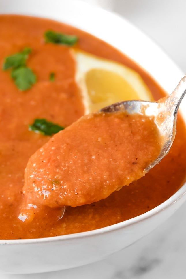 Close-up shot of a bowl of red lentil soup