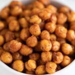 A square photo of a bowl with roasted chickpeas