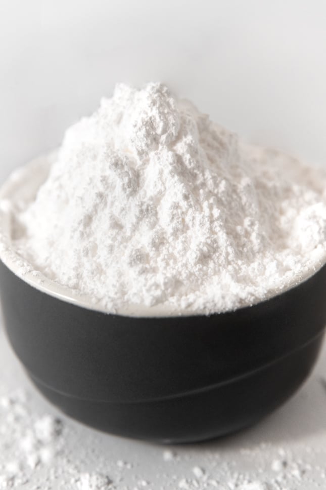 Close-up shot of a bowl of powdered sugar