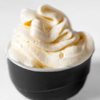 Square photo of a bowl of vegan buttercream frosting