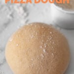 Photo of a homemade pizza dough with the words homemade pizza dough