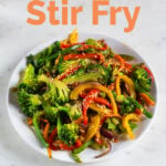 A picture of a dish with veggie stir fry made from scratch with the words veggie stir fry