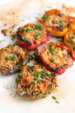 Photo of 6 vegan stuffed peppers on a plate
