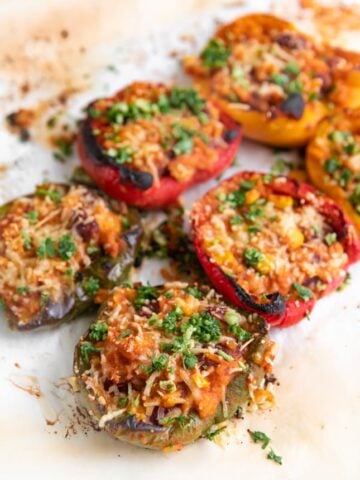 Photo of 6 vegan stuffed peppers on a plate