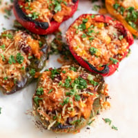 Square photo of some vegan stuffed peppers