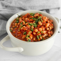 Square photo of a bowl with a black eyed peas recipe