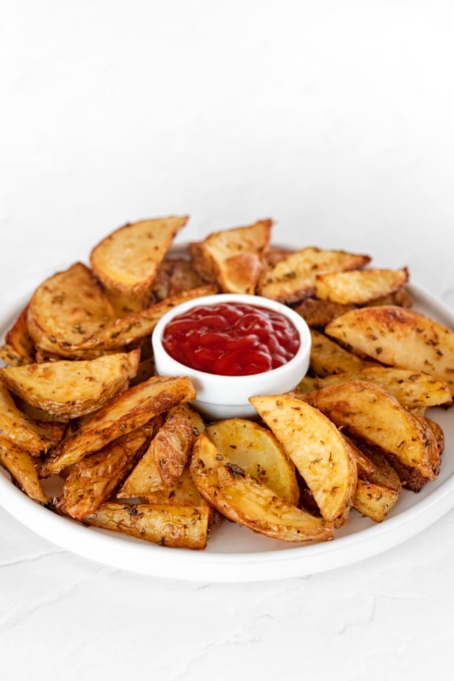 Photo of a plate of potato wedges