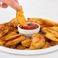 Square photo of a plate of potato wedges