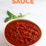 Photo of a bowl of marinara sauce with the words marinara sauce