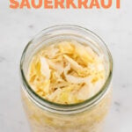 Photo of a jar of sauerkraut with the words how to make sauerkraut