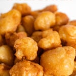 Photo of a bowl of fried cauliflower with the words fried cauliflower