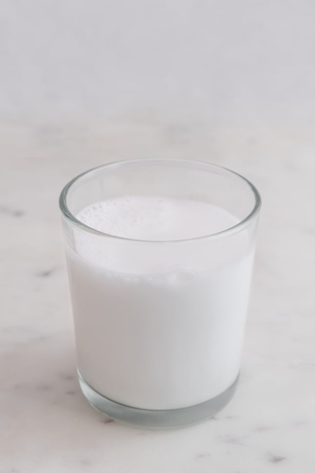 Photo of a glass of homemade coconut milk