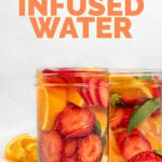 Side-shot of 2 glass jars of fruit infused water with the words fruit infused water