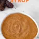 Photo of a bowl of date syrup with the words date syrup