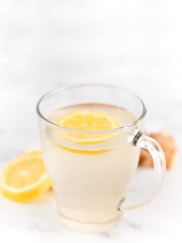 Side photo of a cup of lemon ginger tea