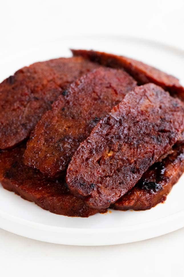 Photo of a plate of vegan bacon