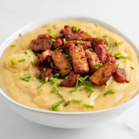 Square photo of a bowl of vegan potato soup