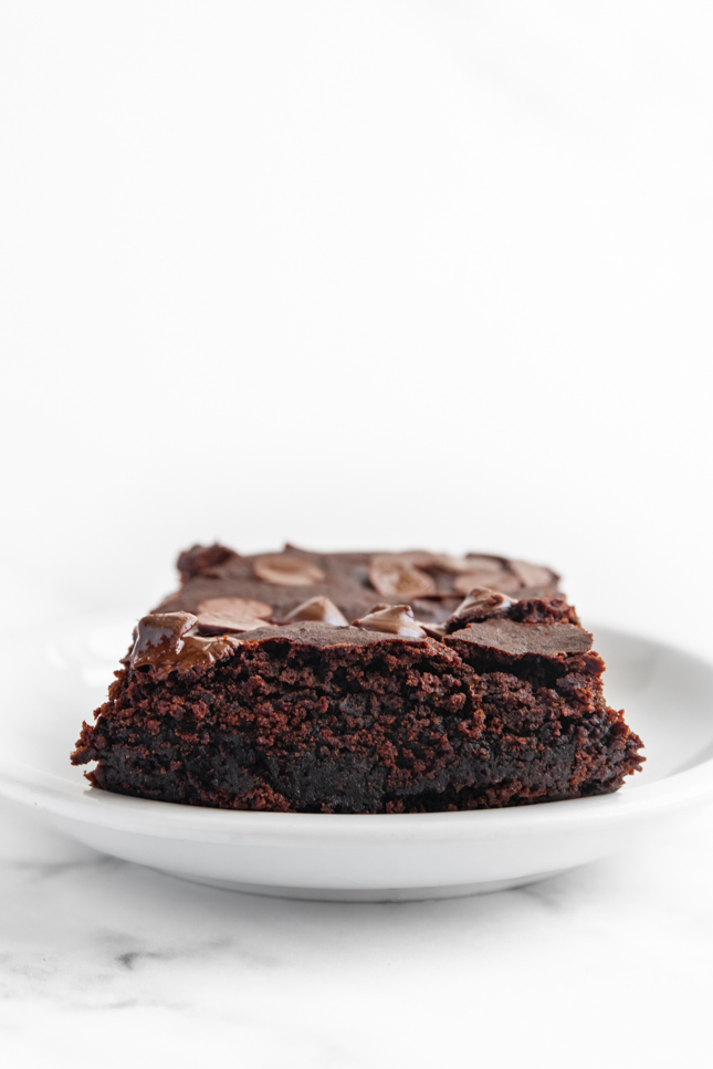 Side shot of a piece of black bean brownies