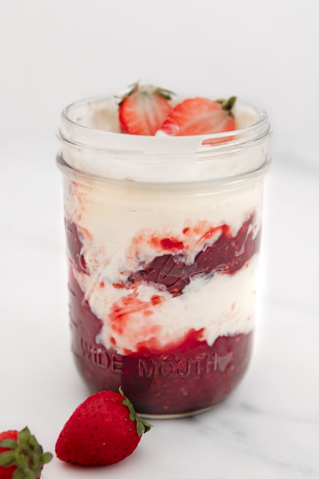 Side photo of a glass jar of coconut yogurt