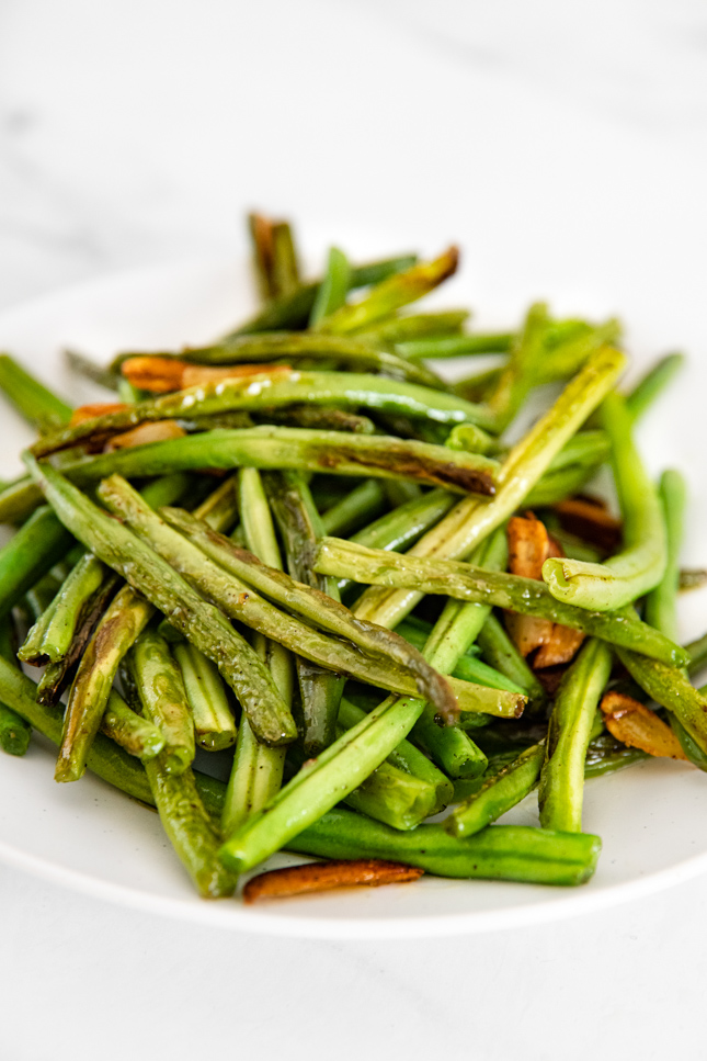 Close-up photo of a plate of garlic green beans