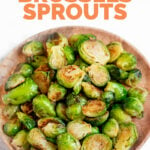 Photo of a plate of sauteed Brussels sprouts with the words sauteed Brussels sprouts