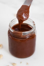 Side photo of a jar of vegan Nutella