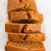 Photo of a sliced loaf of vegan pumpkin bread