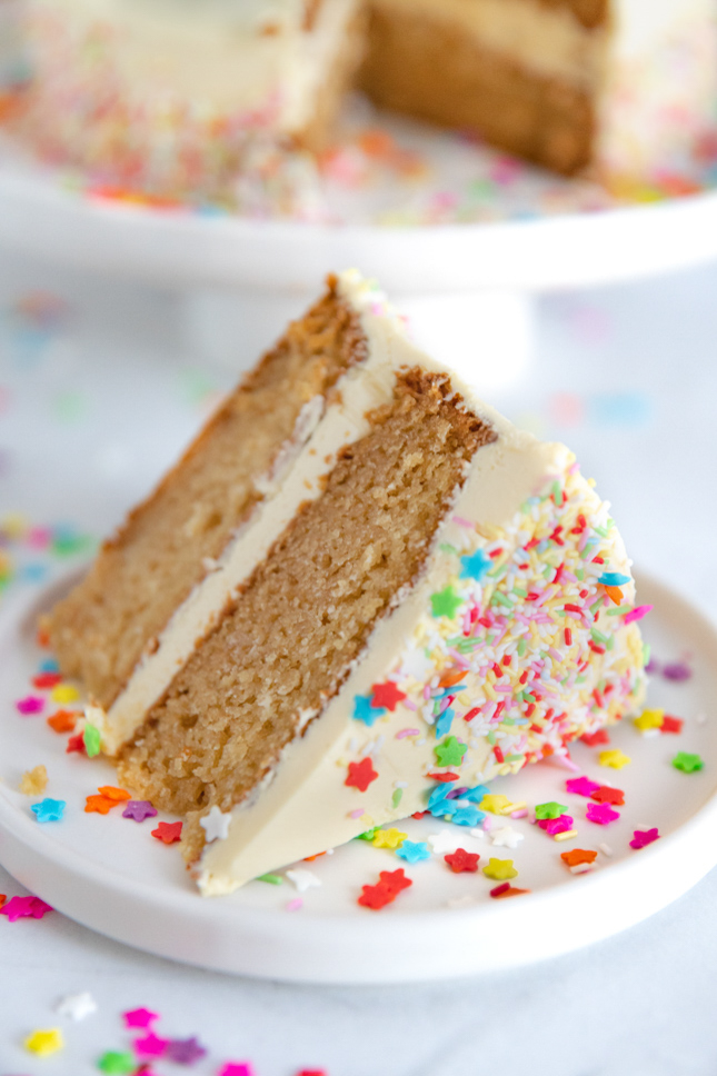 Photo of a slice of vegan vanilla cake