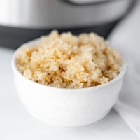 Square photo of a bowl of Instant Pot quinoa
