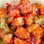 Photo of a plate of sweet and sour tofu with the words sweet and sour tofu