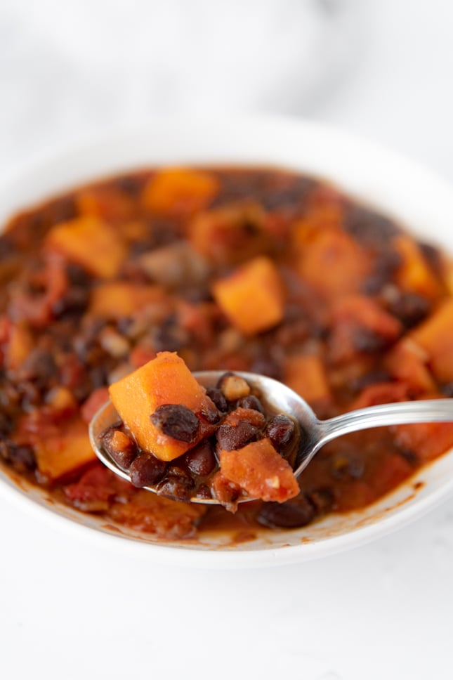 Photo of a spoonful of sweet potato black bean chili